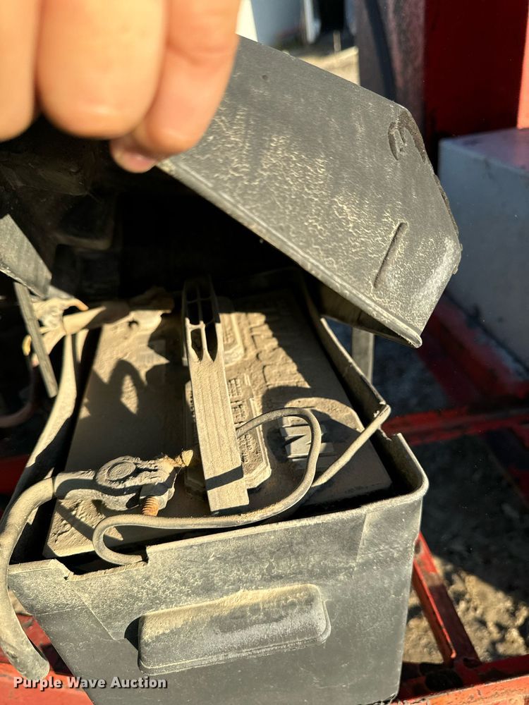 image for item DN0760 Crafco EZ Pour pot hole patcher 