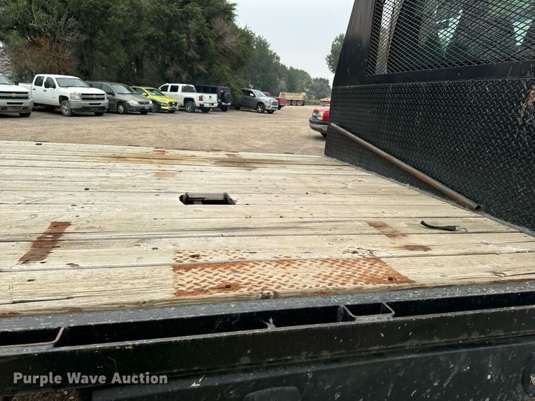 image for item DP8458 2005 GMC C7500 flatbed truck