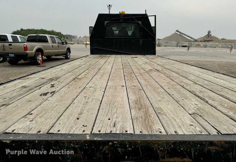 image for item DP8458 2005 GMC C7500 flatbed truck