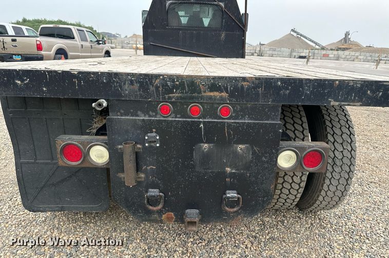 image for item DP8458 2005 GMC C7500 flatbed truck