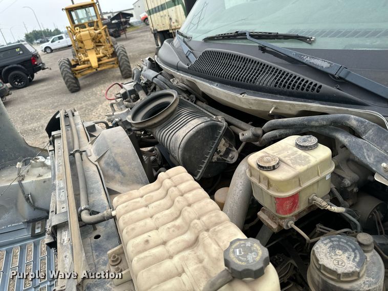 image for item DP8458 2005 GMC C7500 flatbed truck