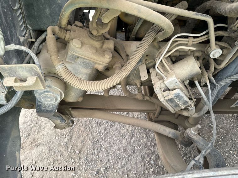 image for item DP8458 2005 GMC C7500 flatbed truck