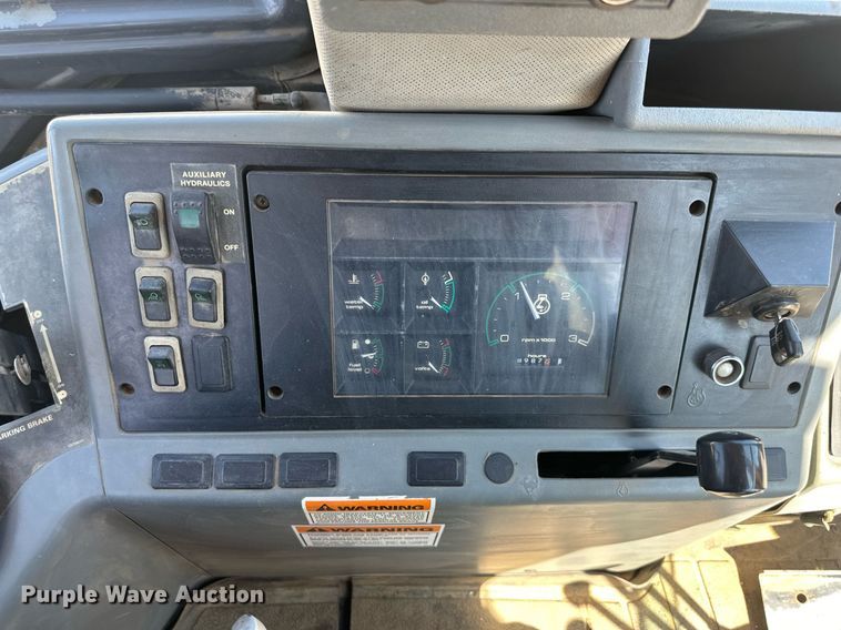 image for item EJ7244 1999 Case 580 Super L backhoe