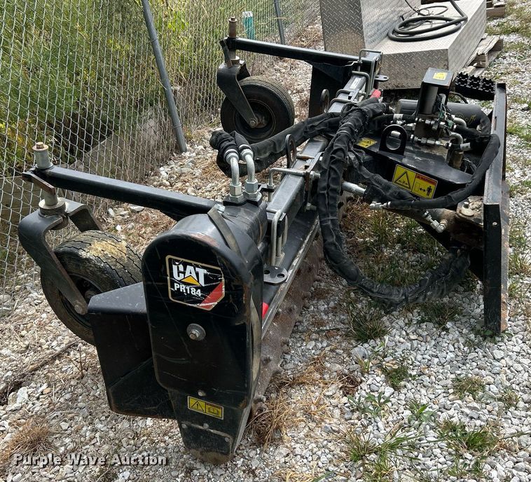 image for item EK3324 2018 Caterpillar  PR184 skid steer box rake 