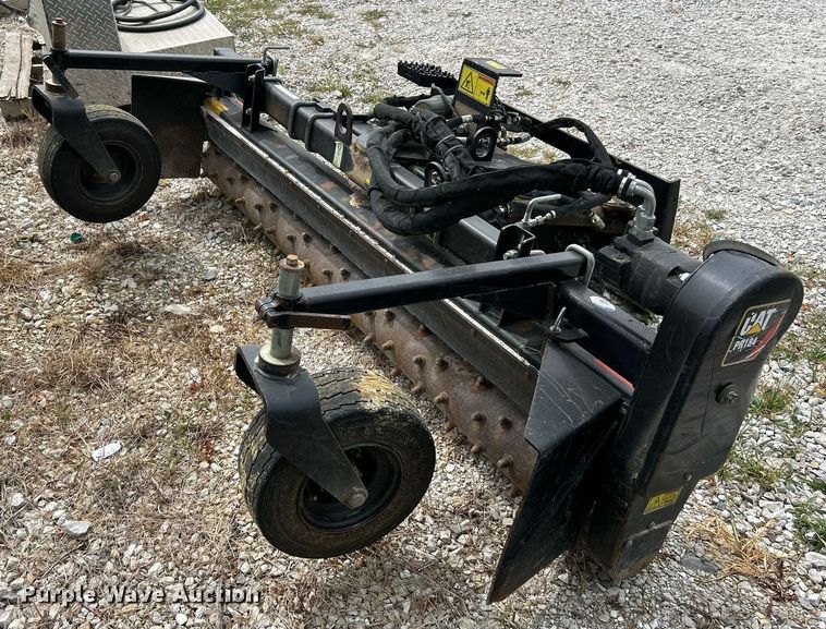 image for item EK3324 2018 Caterpillar  PR184 skid steer box rake 
