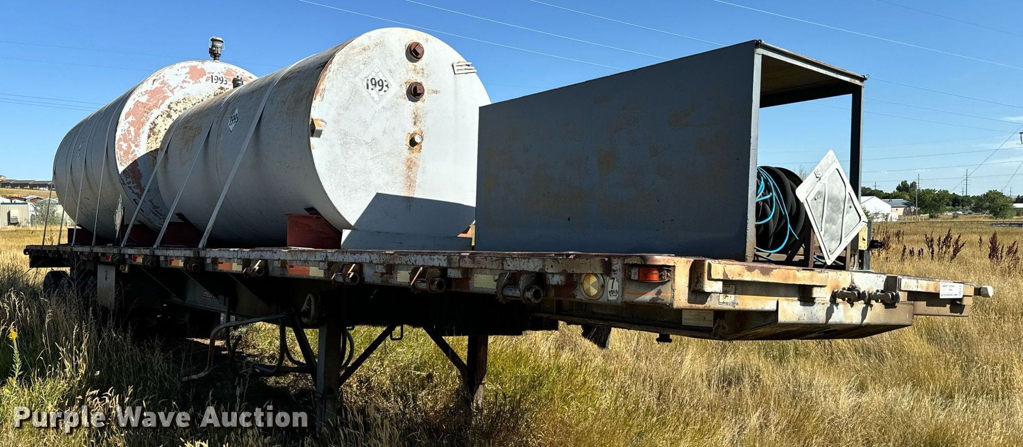 1987 Utility 8x40 flatbed trailer in Rapid City, SD Item EE7747 for
