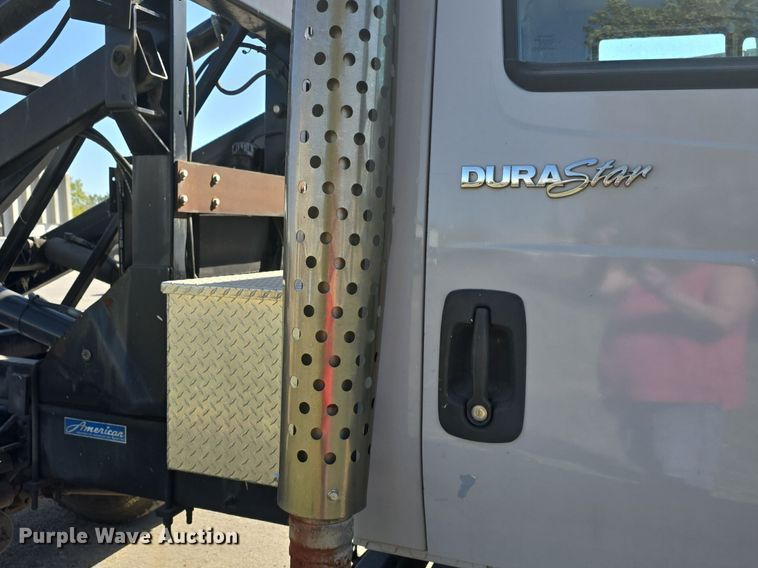 image for item DO7704 2009 International Dura Star 4300  dumpster carrier truck