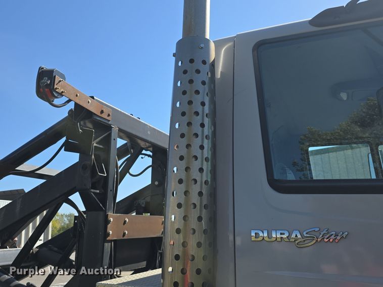 image for item DO7704 2009 International Dura Star 4300  dumpster carrier truck