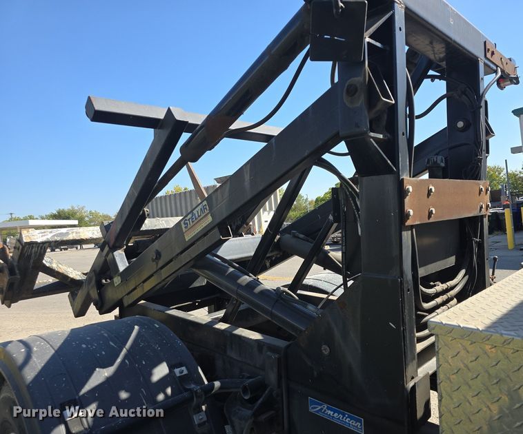 image for item DO7704 2009 International Dura Star 4300  dumpster carrier truck