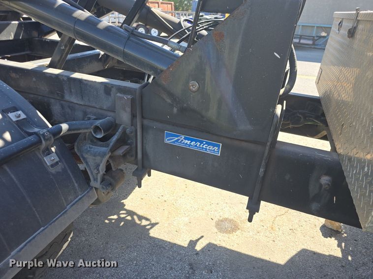 image for item DO7704 2009 International Dura Star 4300  dumpster carrier truck