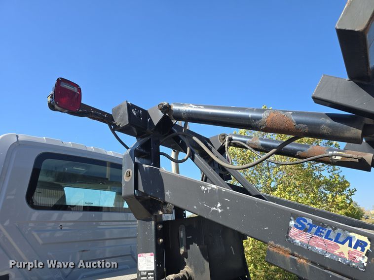 image for item DO7704 2009 International Dura Star 4300  dumpster carrier truck