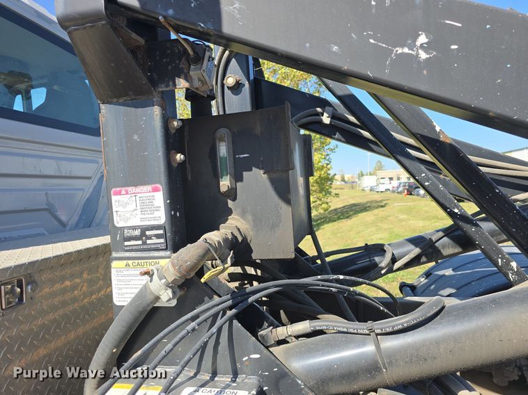 image for item DO7704 2009 International Dura Star 4300  dumpster carrier truck