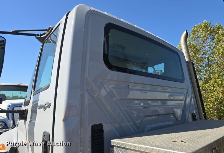 image for item DO7704 2009 International Dura Star 4300  dumpster carrier truck