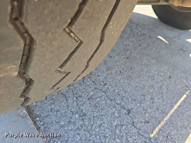 image for item DO7704 2009 International Dura Star 4300  dumpster carrier truck