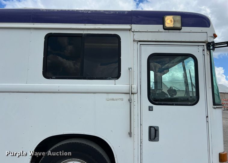 image for item EJ2999 2000 Blue Bird blood donation bus