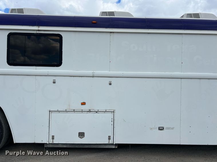 image for item EJ2999 2000 Blue Bird blood donation bus