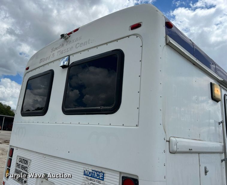 image for item EJ2999 2000 Blue Bird blood donation bus