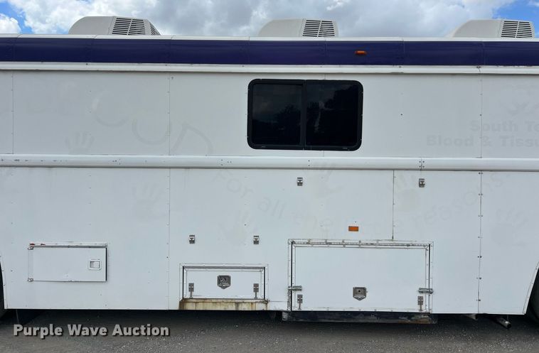 image for item EJ2999 2000 Blue Bird blood donation bus