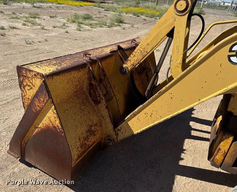 image for item EJ3057 1998 John Deere  310SE backhoe