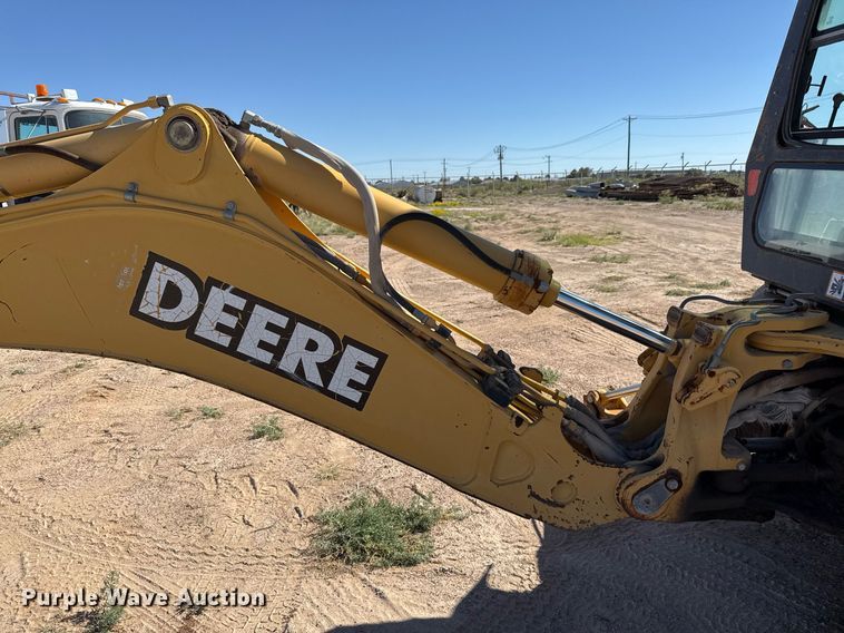 image for item EJ3057 1998 John Deere  310SE backhoe