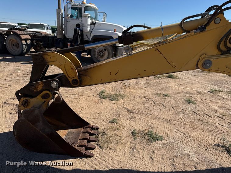 image for item EJ3057 1998 John Deere  310SE backhoe