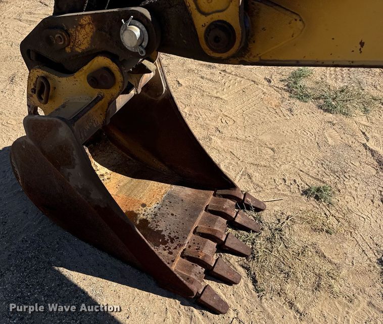 image for item EJ3057 1998 John Deere  310SE backhoe