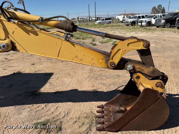 image for item EJ3057 1998 John Deere  310SE backhoe