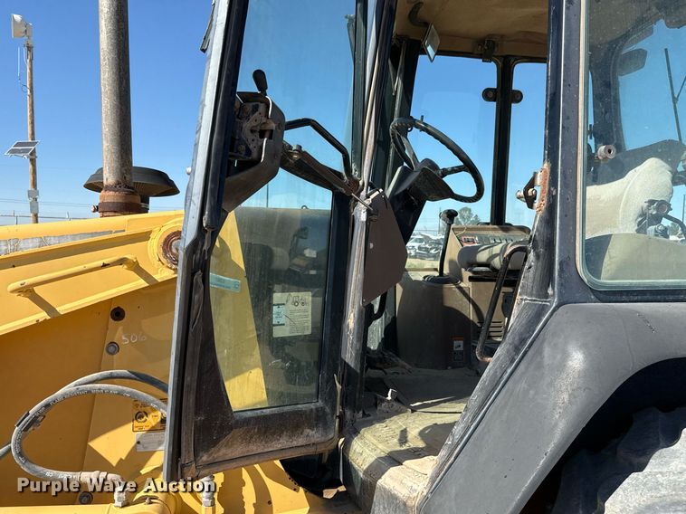 image for item EJ3057 1998 John Deere  310SE backhoe