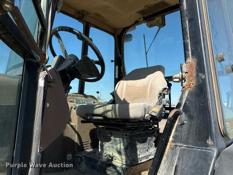 image for item EJ3057 1998 John Deere  310SE backhoe