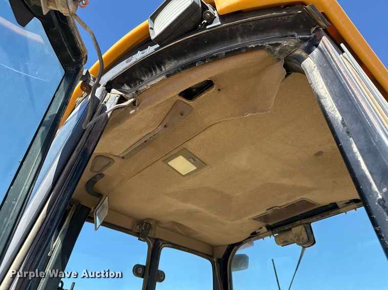 image for item EJ3057 1998 John Deere  310SE backhoe