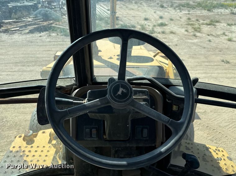 image for item EJ3057 1998 John Deere  310SE backhoe