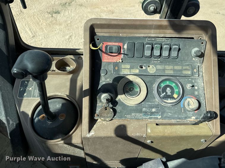 image for item EJ3057 1998 John Deere  310SE backhoe