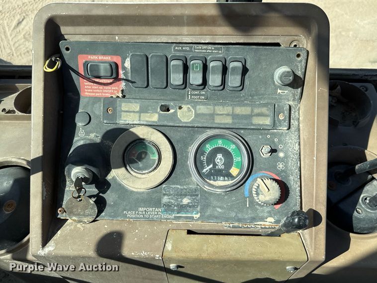 image for item EJ3057 1998 John Deere  310SE backhoe