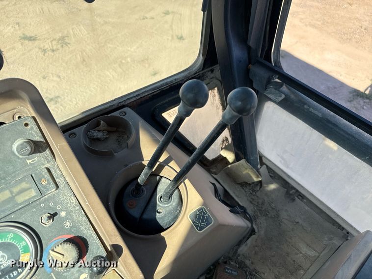 image for item EJ3057 1998 John Deere  310SE backhoe