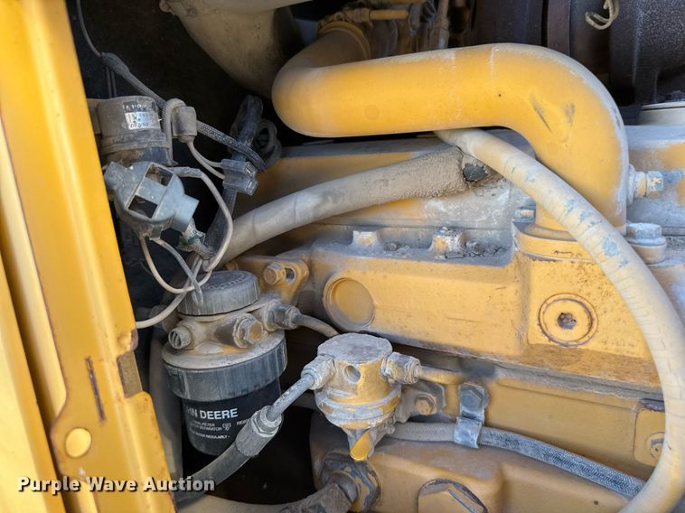 image for item EJ3057 1998 John Deere  310SE backhoe