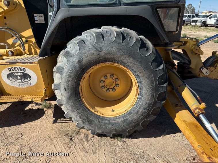 image for item EJ3057 1998 John Deere  310SE backhoe