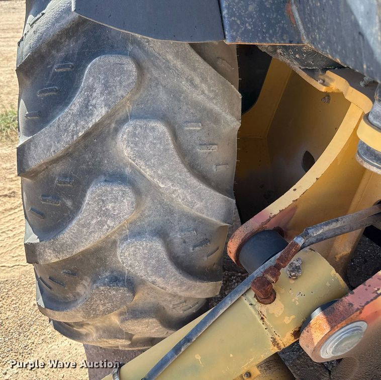 image for item EJ3057 1998 John Deere  310SE backhoe