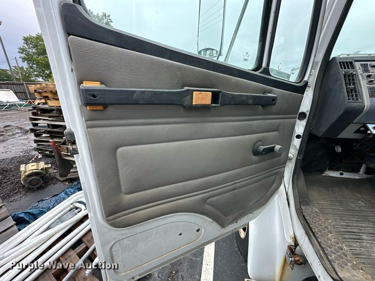 image for item EN0002 2003 Freightliner  FL60 dump truck