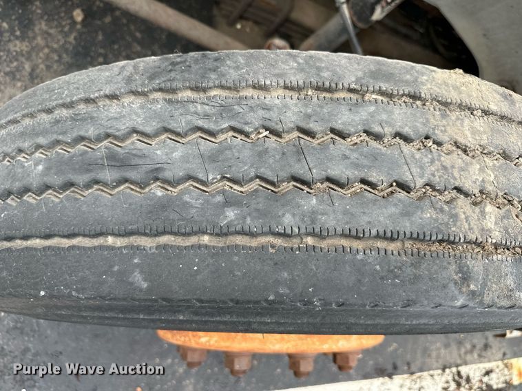 image for item EN0002 2003 Freightliner  FL60 dump truck