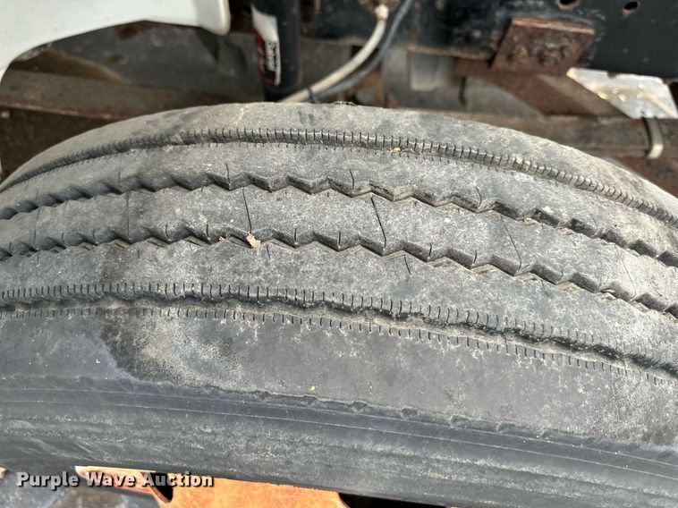 image for item EN0002 2003 Freightliner  FL60 dump truck