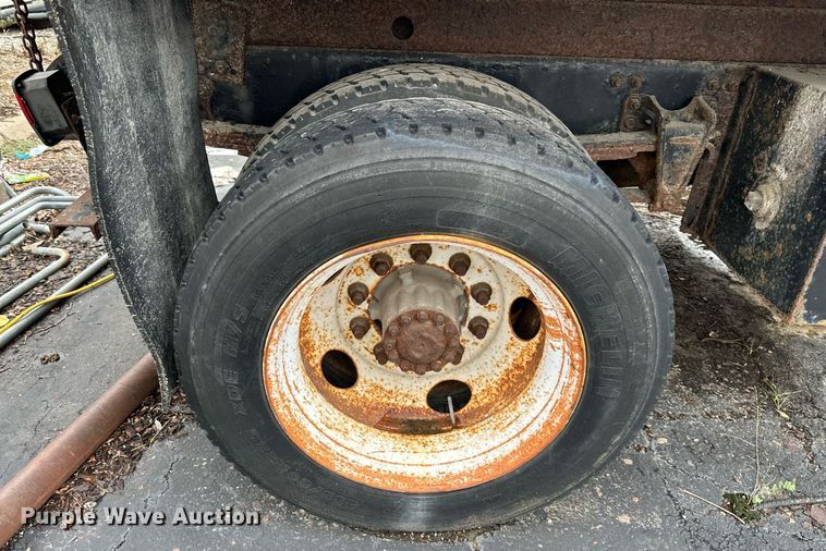 image for item EN0002 2003 Freightliner  FL60 dump truck