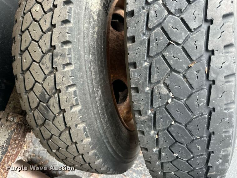 image for item EN0002 2003 Freightliner  FL60 dump truck