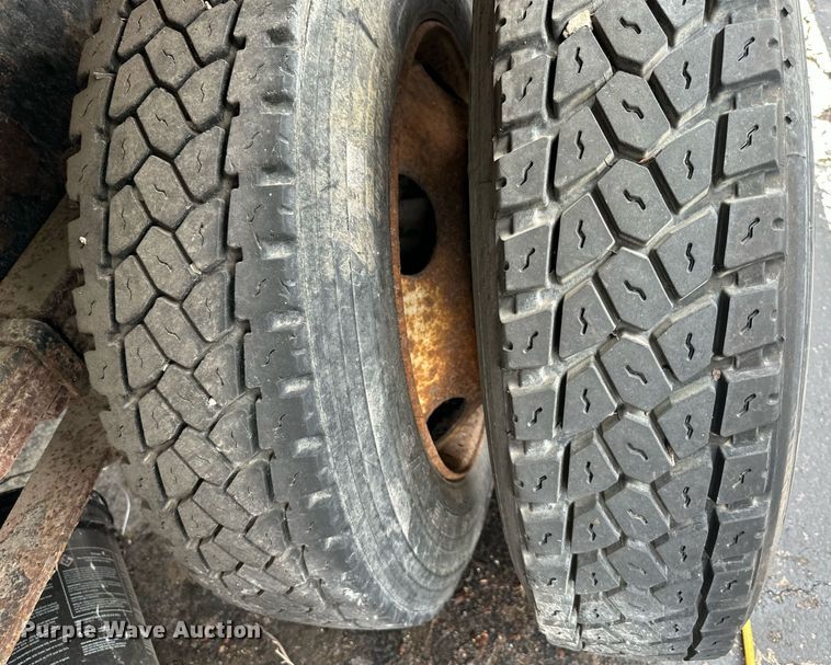 image for item EN0002 2003 Freightliner  FL60 dump truck