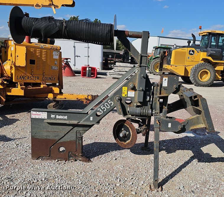 image for item LW9898 Bobcat skid steer fence installer