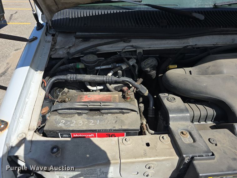 image for item LW9916 2004 Ford E350 Super Duty shuttle bus