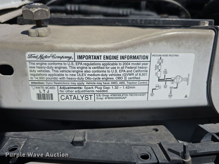 image for item LW9916 2004 Ford E350 Super Duty shuttle bus