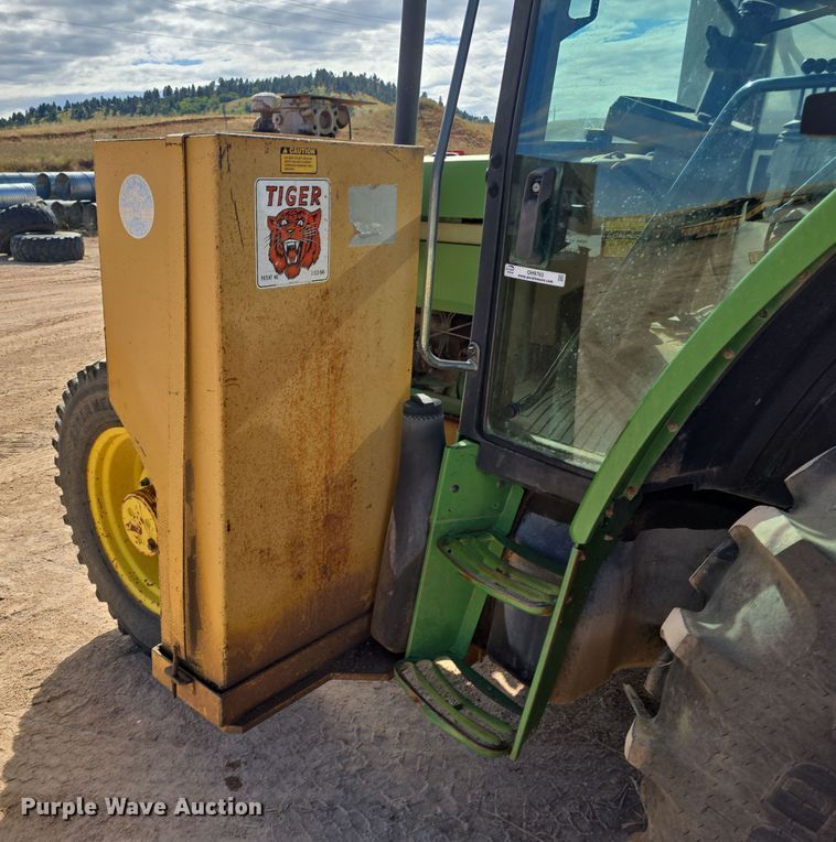 image for item OH9765 1994 John Deere  6400 MFWD tractor