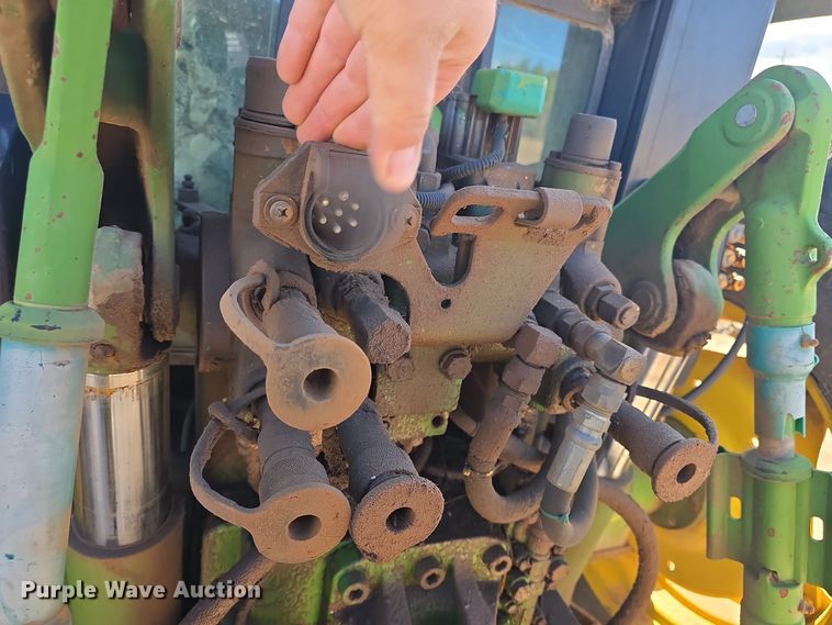 image for item OH9765 1994 John Deere  6400 MFWD tractor