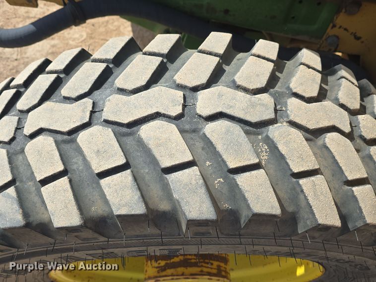 image for item OH9765 1994 John Deere  6400 MFWD tractor