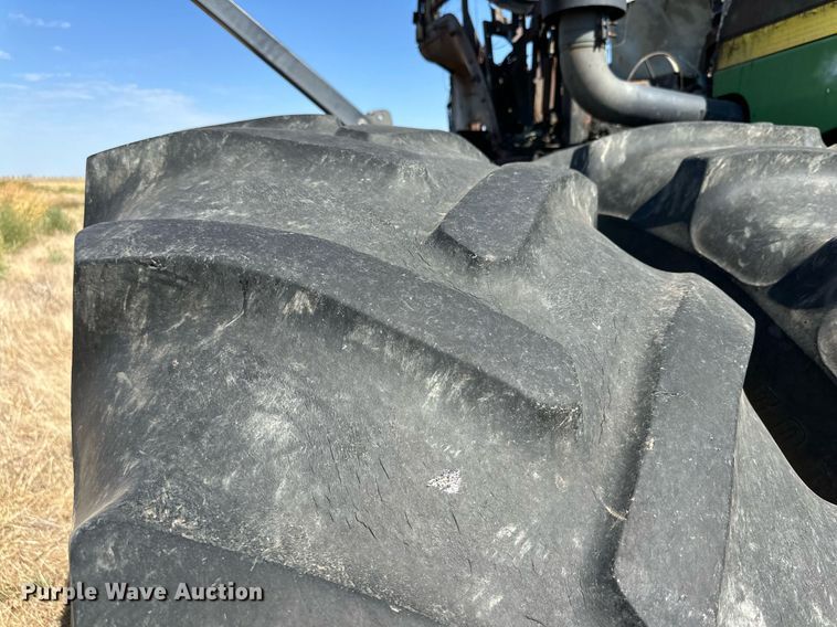 image for item DD3217 1999 John Deere 9300 4WD tractor